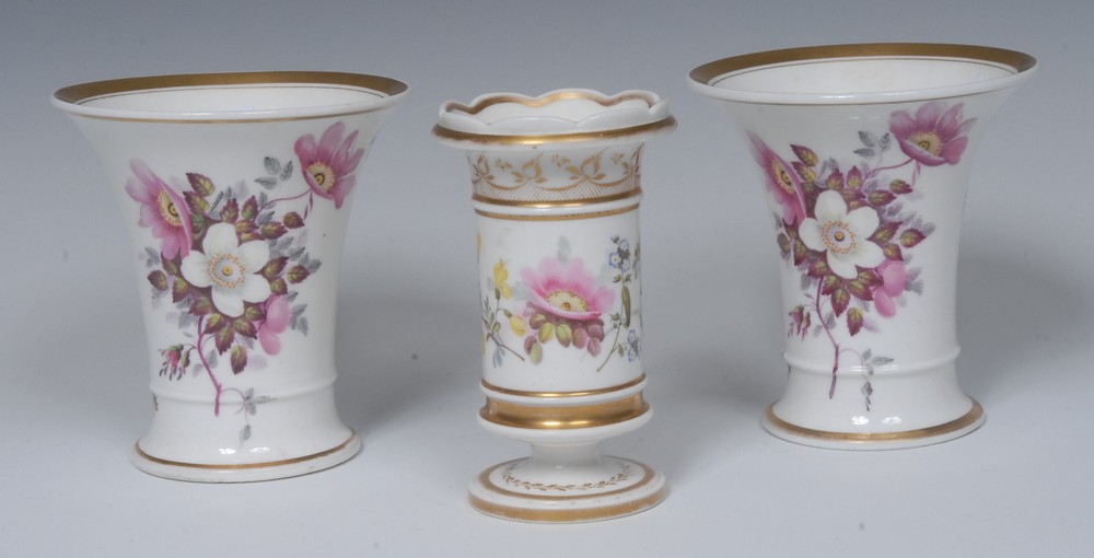 A pair of English porcelain flared cylindrical spill vases, painted with apple blossom,