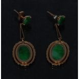 A pair of jadeite and yellow metal droplet earrings,