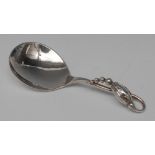 Georg Jensen - a Danish silver Blossom pattern caddy spoon, 10cm long, initials and dotted monogram,