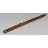 An early 19th century five-piece boxwood flute, by E.G.