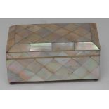 A Victorian mother-of-pearl rectangular table-top casket, veneered overall with lozenges,