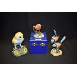 A Royal Crown Derby model of a Robin, first quality, boxed; others,