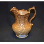 A 19th century brown saltglazed stoneware jug, possibly Brampton,