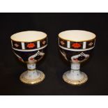 A pair of Royal Crown Derby 1128 pattern goblets, first quality,