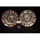 A pair of Royal Crown Derby 1128 pattern plates, 27cm, first quality; another,