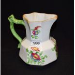 A Dillwyn Swansea Pottery octagonal jug, painted with stylied flowers and foliage,