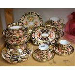 A set of three Royal Crown Derby 2451 pattern teacups,