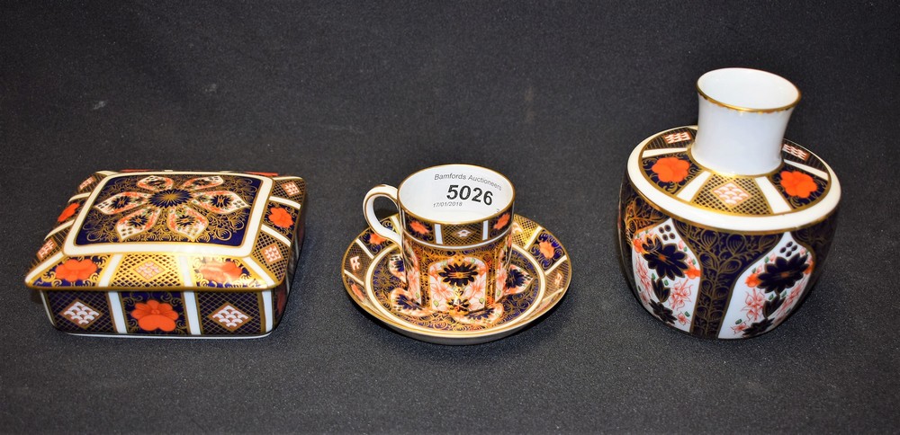 A Royal Crown Derby 1128 pattern rectangular box and cover; a similar coffee can and saucer;