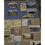 A quantity of postcards World and British to include embroidered Portuguese lady, Africa, Egypt,