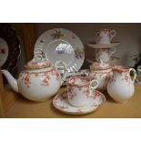 Ceramics - a Royal Worcester part tea service, printed with orange foliate tendrils,