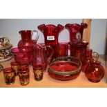 Victorian and later cranberry glass vases, jugs,
