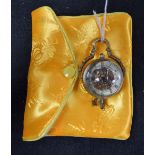 A reproduction brass mounted pendant globe watch