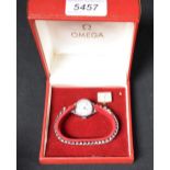 Watches - Omega, a ladys rectangular silvered dial and movement, brushed silvered dial, baton ,