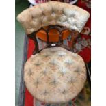 A mid-Victorian mahogany and silk salon chair, ceramic castors, c,