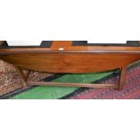 A drop leaf coffee table