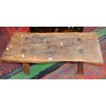 An oak rustic coffee table made from a section of oak.