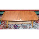 An Ercol coffee table with spindled undertier