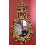 A reproduction giltwood framed girandole mirror