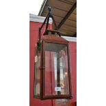 A reproduction leather cased lantern