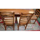 A large oak trestle table, rounded ends, carved cup and cover supports,