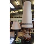 A large German lava lamp with tall shade; a slate contemporary lamp;