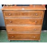 A priory style oak chest of four graduated drawers