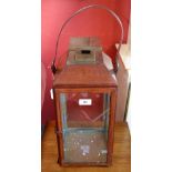 A modern leather cased lantern