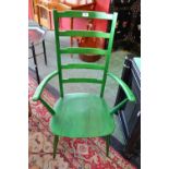 An unusual Ercol green painted ladder back carver chair