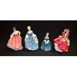 A Royal Doulton ceramic figure, Hilary HN2335; others, Fair Lady (Coral Pink) HN2835,