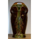 An Art Pottery four handled vase