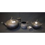 Four Wedgwood black basalt items; teapot and sugar bowl, ensuite,