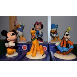A set of six Royal Doulton Mickey Mouse Collection 70th Anniversary models, Goofy, Daisy, Minnie,