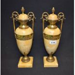 A pair of French Louis XVI Revival gilt-metal mounted marble twin-handled mantel urns,