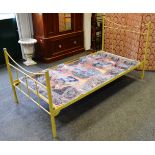 A Victorian style cast metal single bed