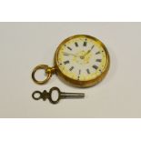 A gold coloured lady's half pocket watch stamped 14k ,