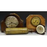 Clocks - a Ferranti Bakelite electric clock, c.1930; an oak mantel clock, c.