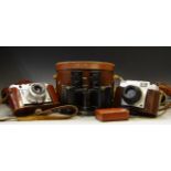 Photographic Interest - a Zeiss Ikon cased camera; a Regula cased camera;