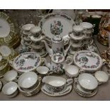 A eight setting Indian Tree pattern tea and dinner service, including two tureens, dinner, side,