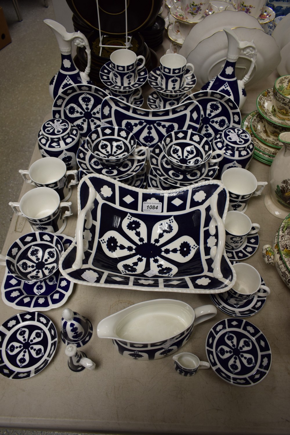 A pair of Royal Crown Derby inglaze blue Kedleston ewers; others, ginger jars, twin handled basket,