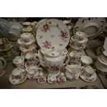 A Royal Crown Derby Posies dinner and tea set for six comprising dinner plates, salad plates,