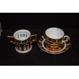 Ceramics - a Royal Crown Derby 1128 miniature cup and saucer;