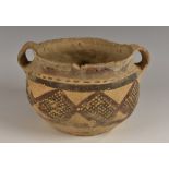 A Chinese Neolithic terracotta twin-handled bowl,