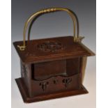 A 19th century Dutch oak carriage foot warmer, pierced and carved with roundels,