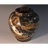 A Breccia marble ovoid vase, quite plain, the specimen stone with white,