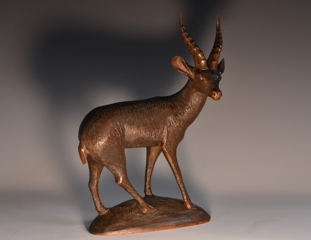 A Black Forest type carving, of an oryx or goat,