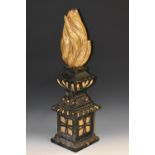 A 19th century parcel-gilt and painted pier finial, flame cresting,