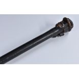 An early 20th century novelty walking cane, the pommel carved as a wigged gentleman,