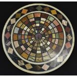A pietra dura circular marble table top, inlaid with radiating bands of graduated specimen stones,