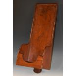 An George III mahogany coaster or shoe, possibly an offertory box, adjustable on a slide, 48cm long,
