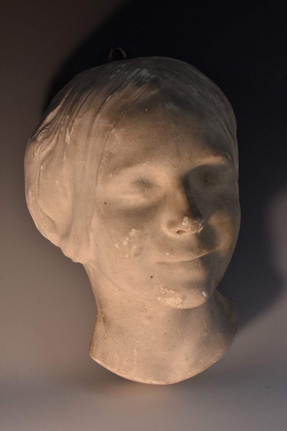 A plaster death mask, by Chenil, London,